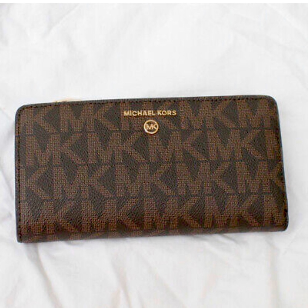 Michael Kors signature pattern continental wallet.